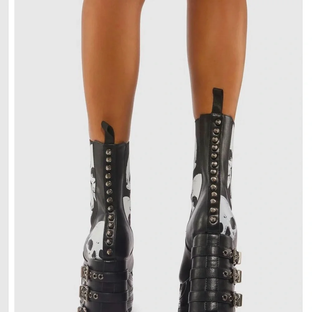 Edgy Black and White Platform Boots with Skull Motif